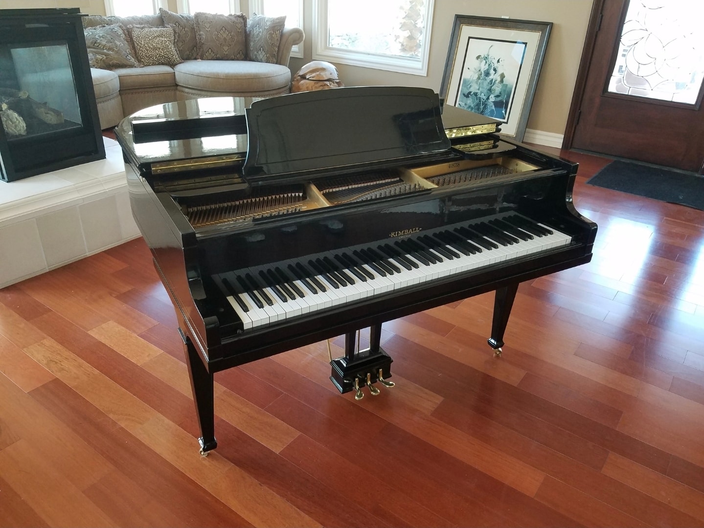 Kimball grand piano with high-gloss black refinished finish