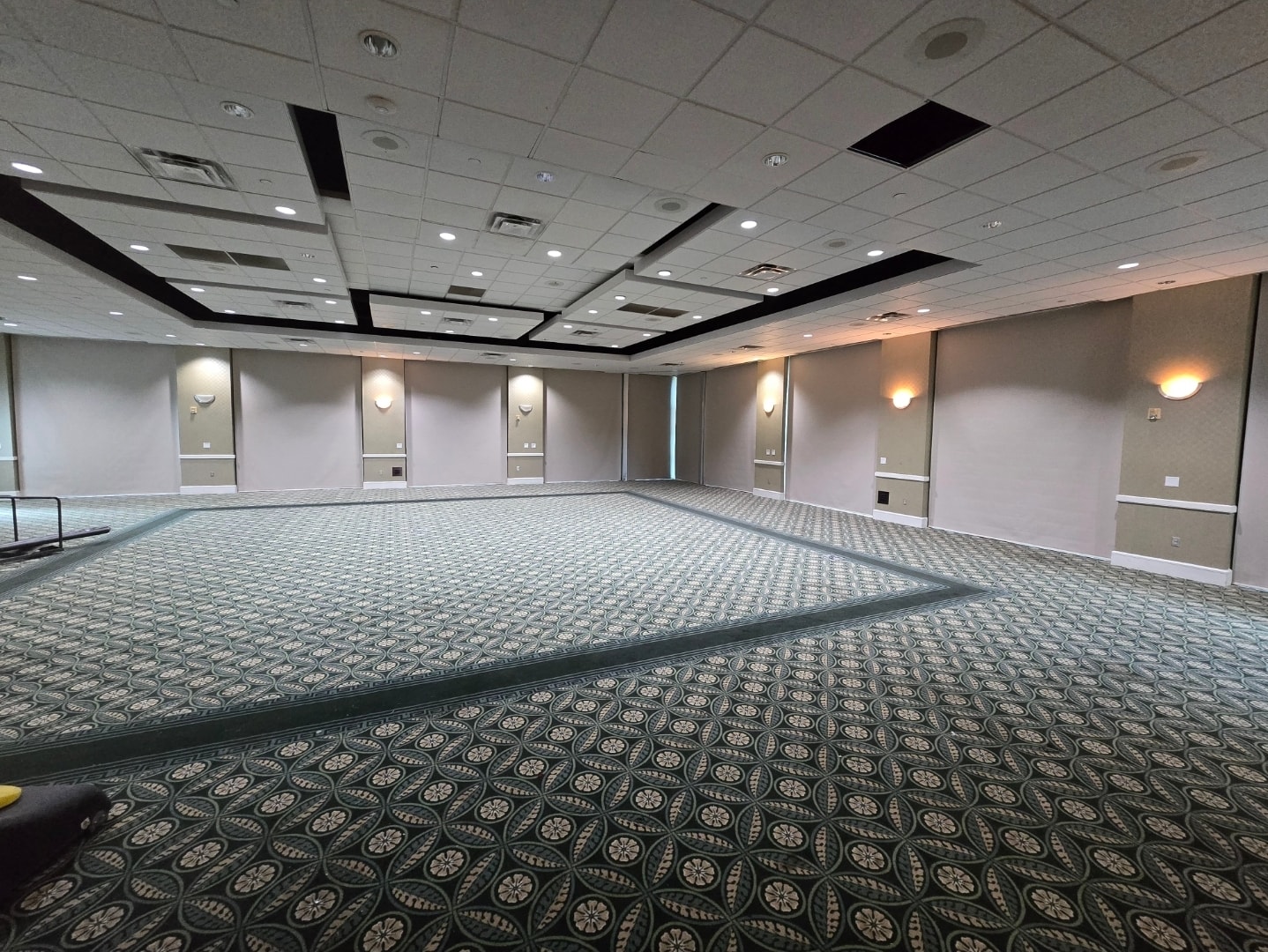 Roller shades in a large commercial ballroom or event venue